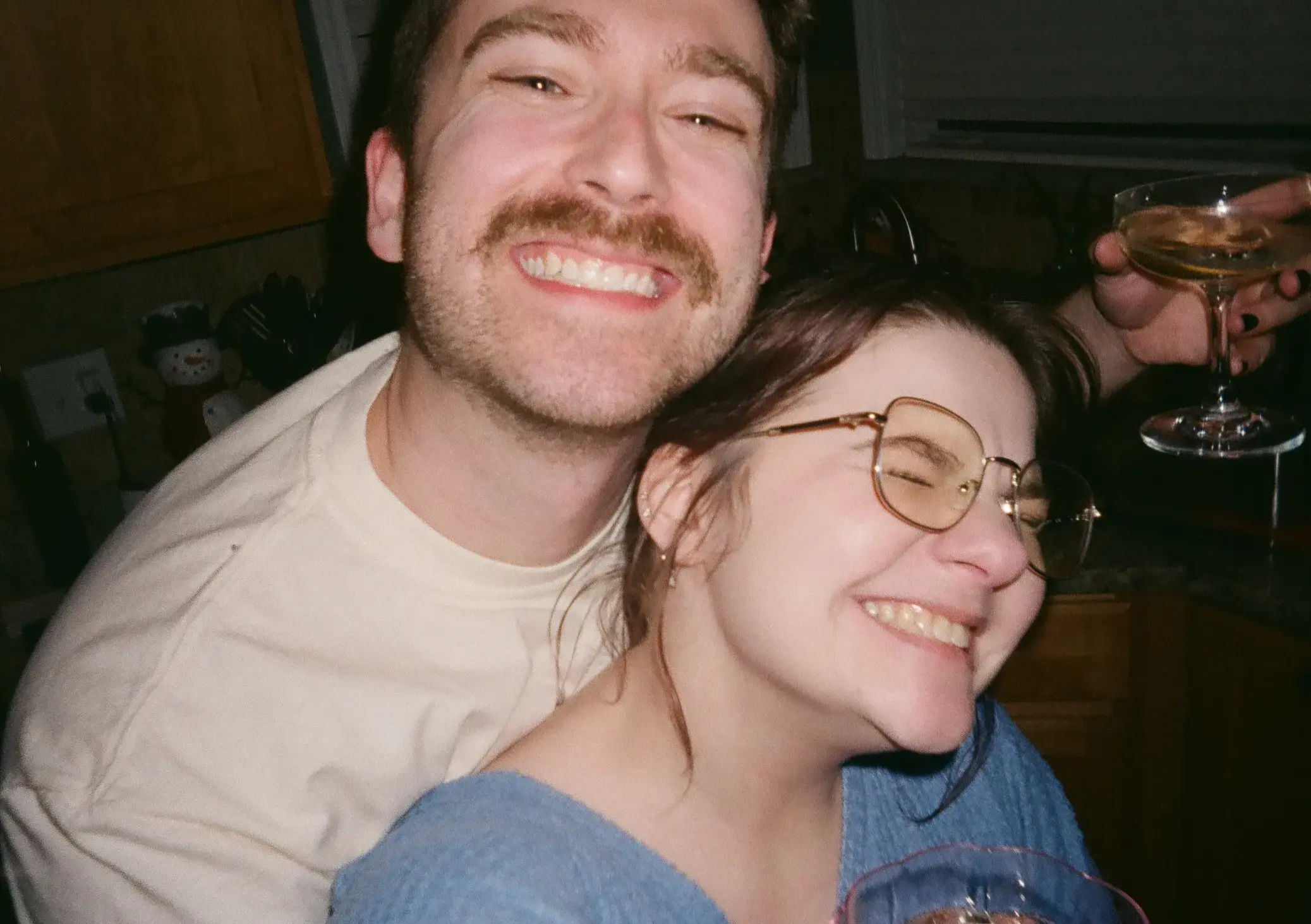 Me and my brother-in-law holding up Gamecube controllers